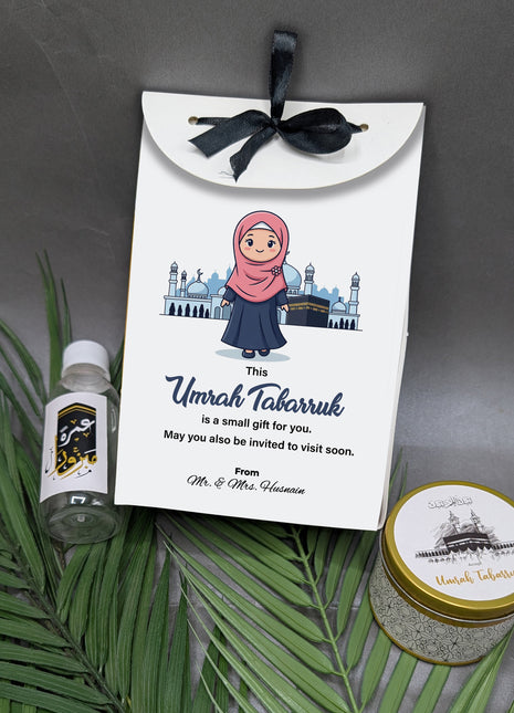 Hajj & Umrah Tabarruk Gift Set – Customized Bag, Tin Box & Zamzam Bottle (Complete Package)