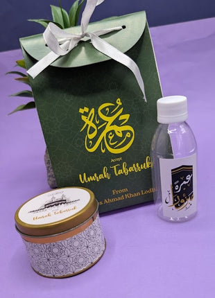 Hajj & Umrah Tabarruk Gift Set – Customized Bag, Tin Box & Zamzam Bottle (Complete Package)
