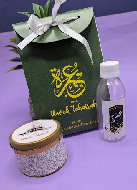 Hajj & Umrah Tabarruk Gift Set – Customized Bag, Tin Box & Zamzam Bottle (Complete Package)