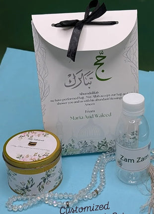 Hajj & Umrah Tabarruk Gift Set – Customized Bag, Tin Box & Zamzam Bottle (Complete Package)
