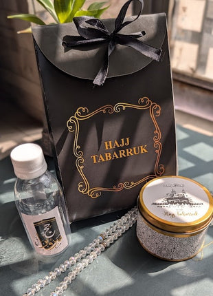 Hajj & Umrah Tabarruk Gift Set – Customized Bag, Tin Box & Zamzam Bottle (Complete Package)