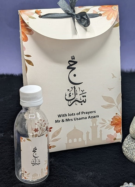 Hajj & Umrah Tabarruk Gift Set – Customized Bag, Tin Box & Zamzam Bottle (Complete Package)