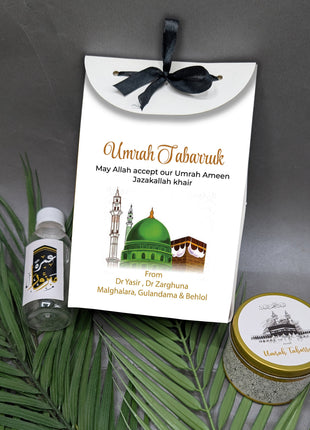Hajj & Umrah Tabarruk Gift Set – Customized Bag, Tin Box & Zamzam Bottle (Complete Package)