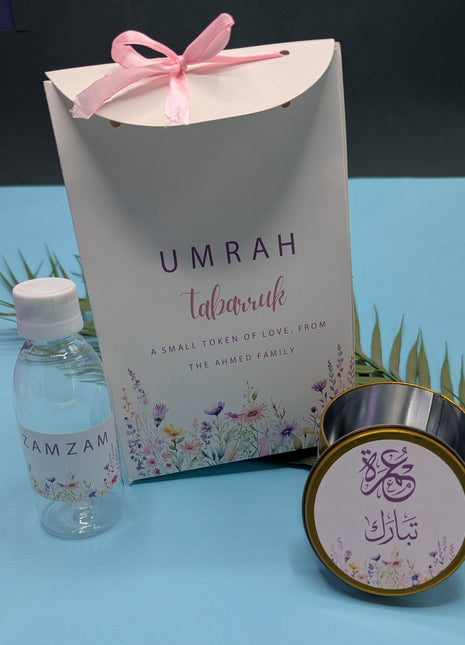 Hajj & Umrah Tabarruk Gift Set – Customized Bag, Tin Box & Zamzam Bottle (Complete Package)