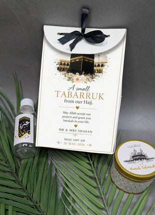 Hajj & Umrah Tabarruk Gift Set – Customized Bag, Tin Box & Zamzam Bottle (Complete Package)