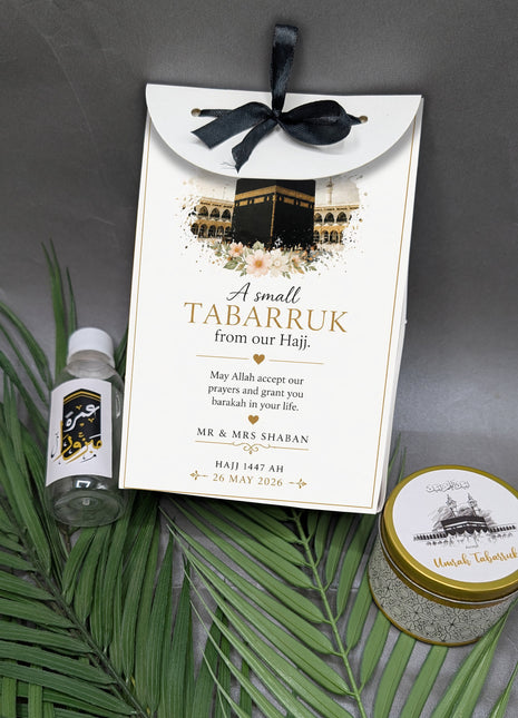 Hajj & Umrah Tabarruk Gift Set – Customized Bag, Tin Box & Zamzam Bottle (Complete Package)