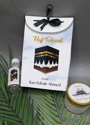 Hajj & Umrah Tabarruk Gift Set – Customized Bag, Tin Box & Zamzam Bottle (Complete Package)