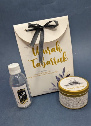 Hajj & Umrah Tabarruk Gift Set – Customized Bag, Tin Box & Zamzam Bottle (Complete Package)