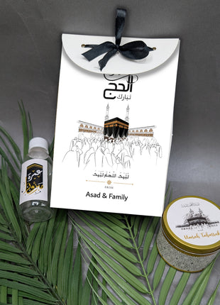 Hajj & Umrah Tabarruk Gift Set – Customized Bag, Tin Box & Zamzam Bottle (Complete Package)
