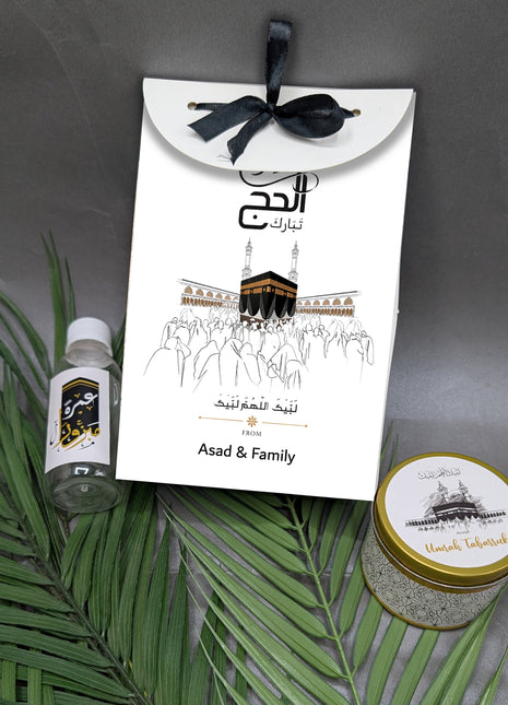 Hajj & Umrah Tabarruk Gift Set – Customized Bag, Tin Box & Zamzam Bottle (Complete Package)