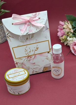 Hajj & Umrah Tabarruk Gift Set – Customized Bag, Tin Box & Zamzam Bottle (Complete Package)