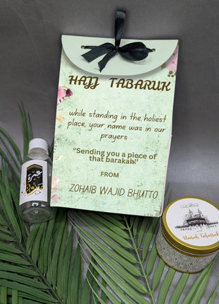 Hajj & Umrah Tabarruk Gift Set – Customized Bag, Tin Box & Zamzam Bottle (Complete Package)